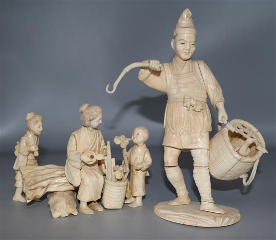 A Japanese ivory figure of a farmer, a goose and a gardener group
